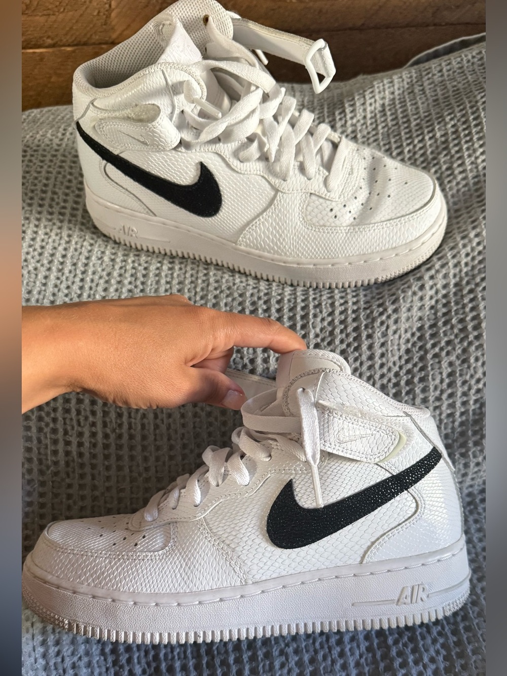 Nike White High-Top Sneakers with Black Swoosh Accent